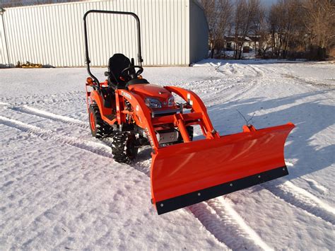 kubota skid steer plowing snow|kubota tractor attachments snow plows.